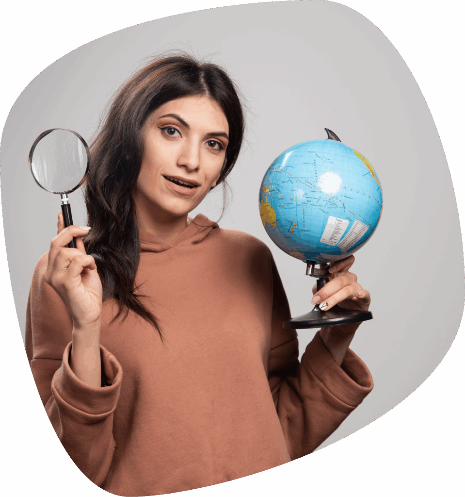 brunette-woman-posing-with-magnifying-glass-globe